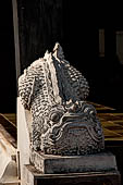 Chiang Mai - The Wat Chedi Luang, guardian at the entrance of a secondary vihan in the form of  Mom, an aquatic mythical creatures . 